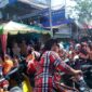 Warga nampak terlihat antrian dibadan jalan Merdeka Kecamatan Tanjung Tiram. (Zulnas)