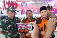 Bupati Batubara yang Juga Ketua MPO PP Batubara menyampaikan sambutannya usai acara Muscab V PP Batubara di Pendopo Serbaguna Simpang Dolok Kecamatan Datuk Lima Puluh. (Km)