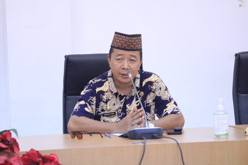 Teks foto : Pemaparan yang disampiakan oleh Asisten II Perekonomian dan Pembangunan Drs. Ikramsyah Putra Nasution, MM.